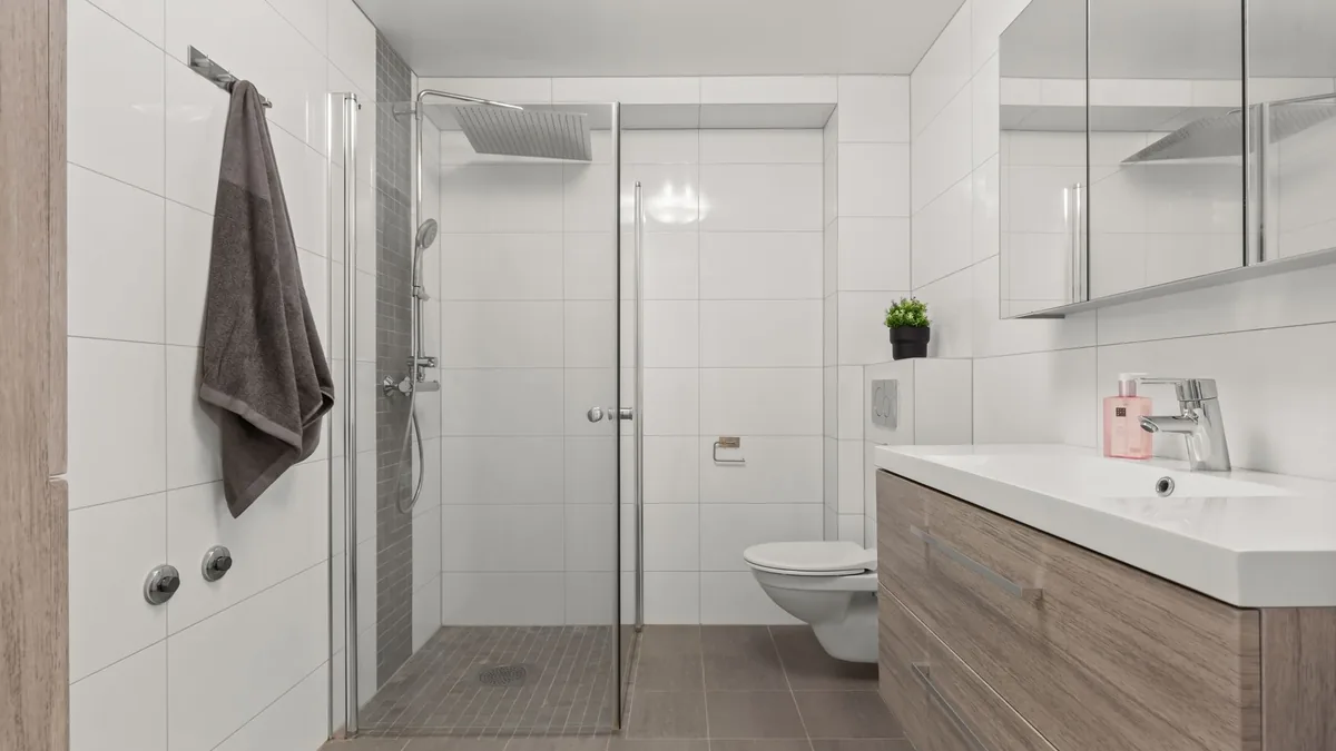Curbless walk-in shower with glass panel in Des Moines, IA